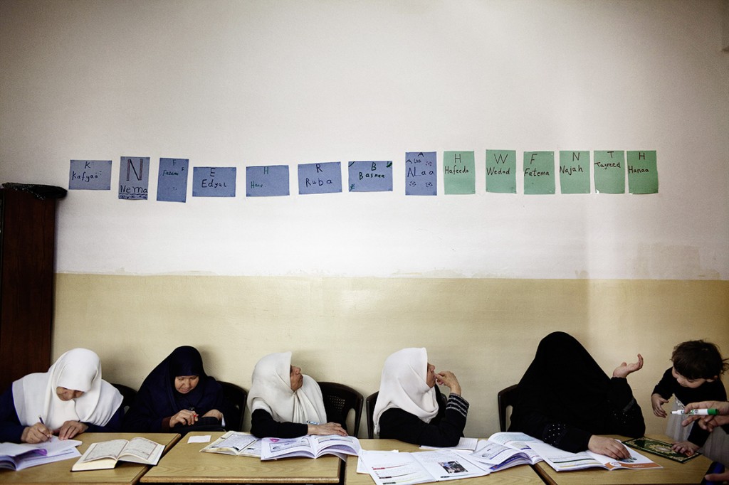 Jordanian women attend a literacy class in the suburbs of Amman 30 May 2012.